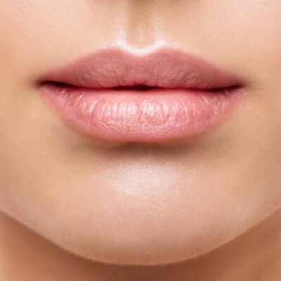 A close up of the lips and chin of a woman